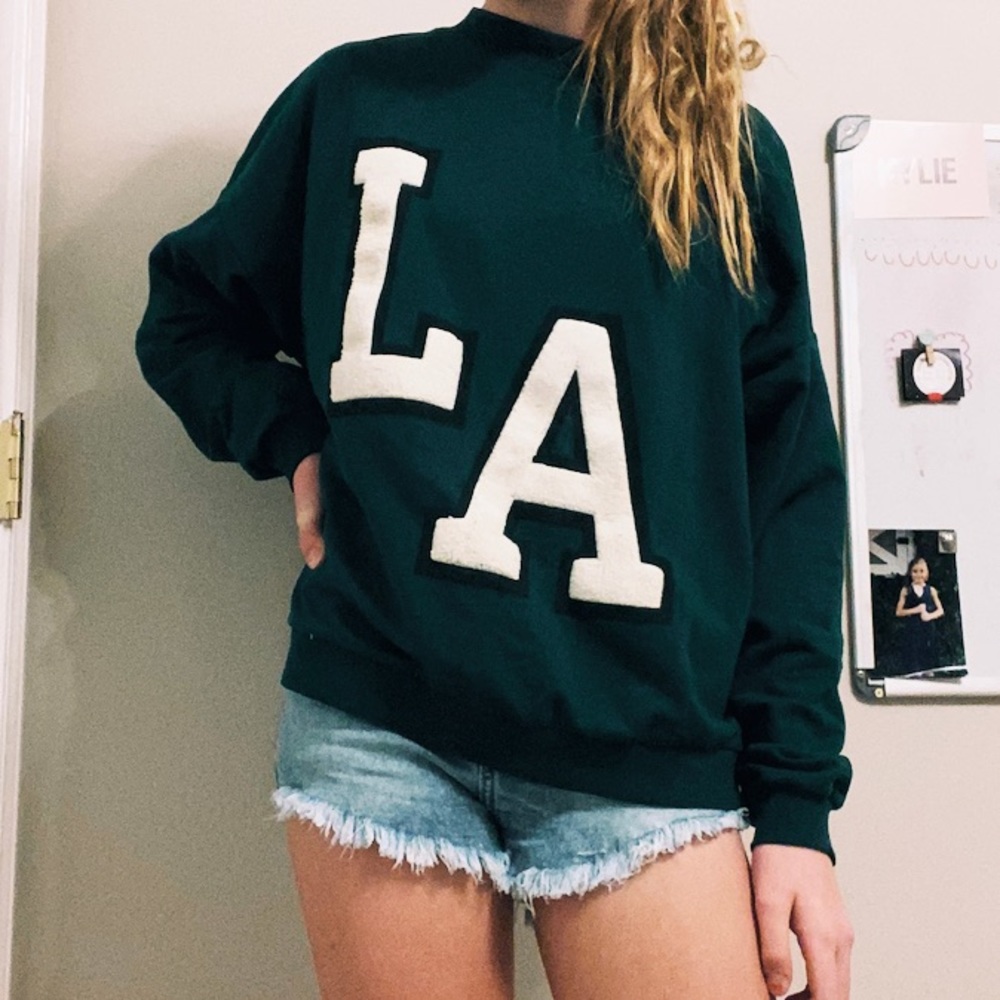 Forest green long sleeve sweatshirt with no hood.